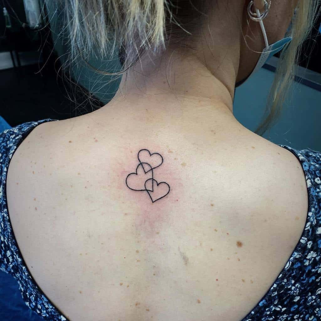 Three Interconnected Hearts Tattoo on the Upper Back Tattoo Design