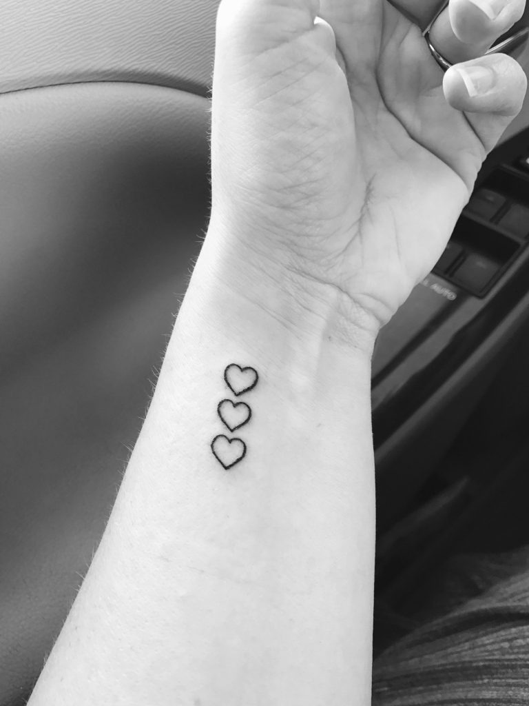 Trio of Hearts Tattoo with a Delicate Line Design Tattoo Design