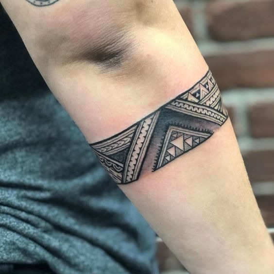 Armband With Various Triangle Motifs Tiki Tattoo Tattoo Design