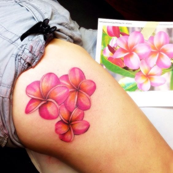 Plumeria Flowers on the Upper Thigh Tattoo Design