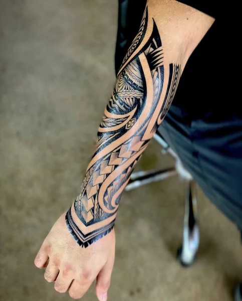Polynesian-Inspired Tribal Forearm Tattoo Tattoo Design