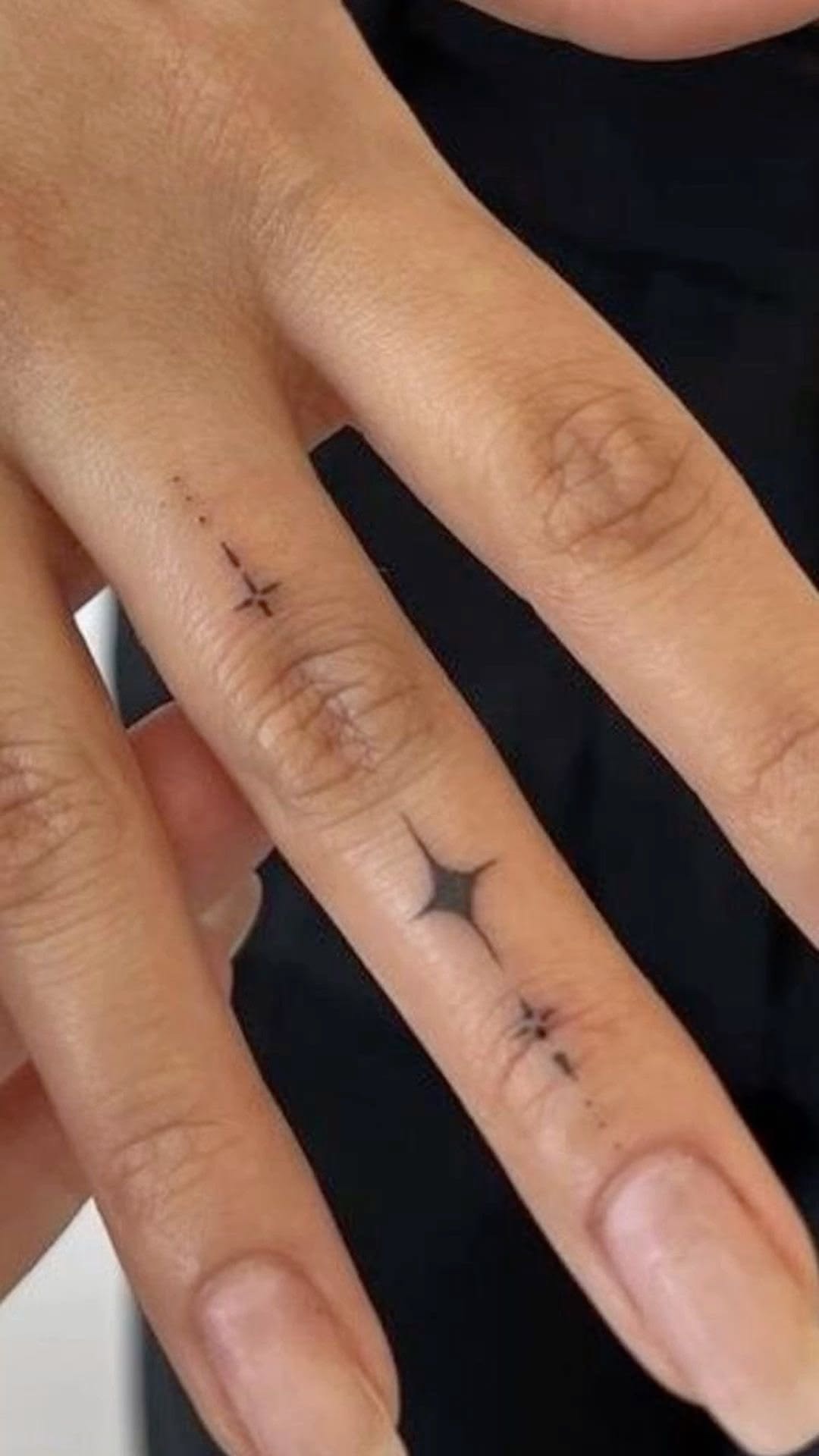 Tiny Spark Finger Tattoo Tattoo Design