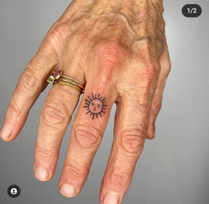 Tiny Sun Face Finger Tattoo Tattoo Design