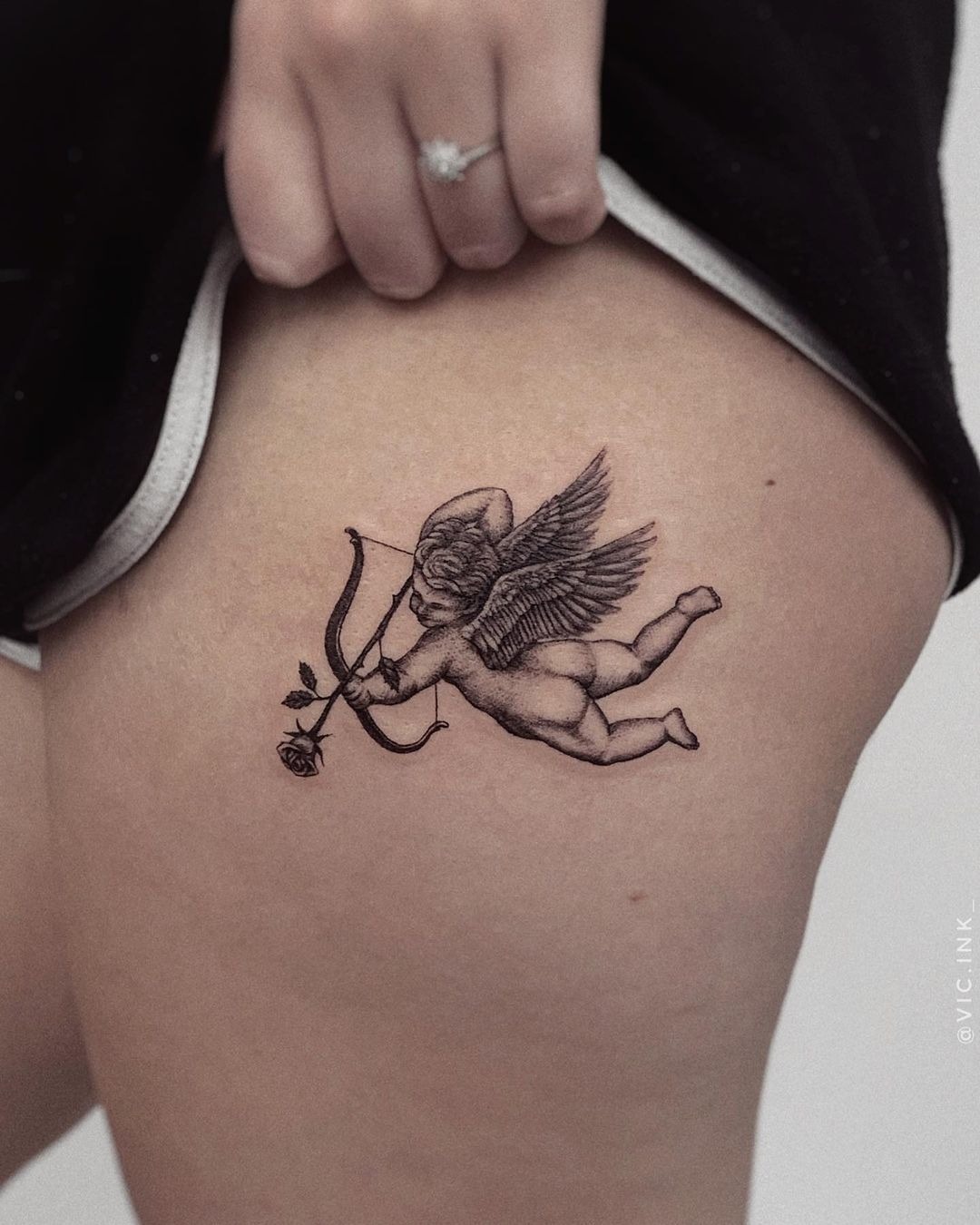 Cupid with Rose Arrow (Tiny Thigh) Tattoo Design