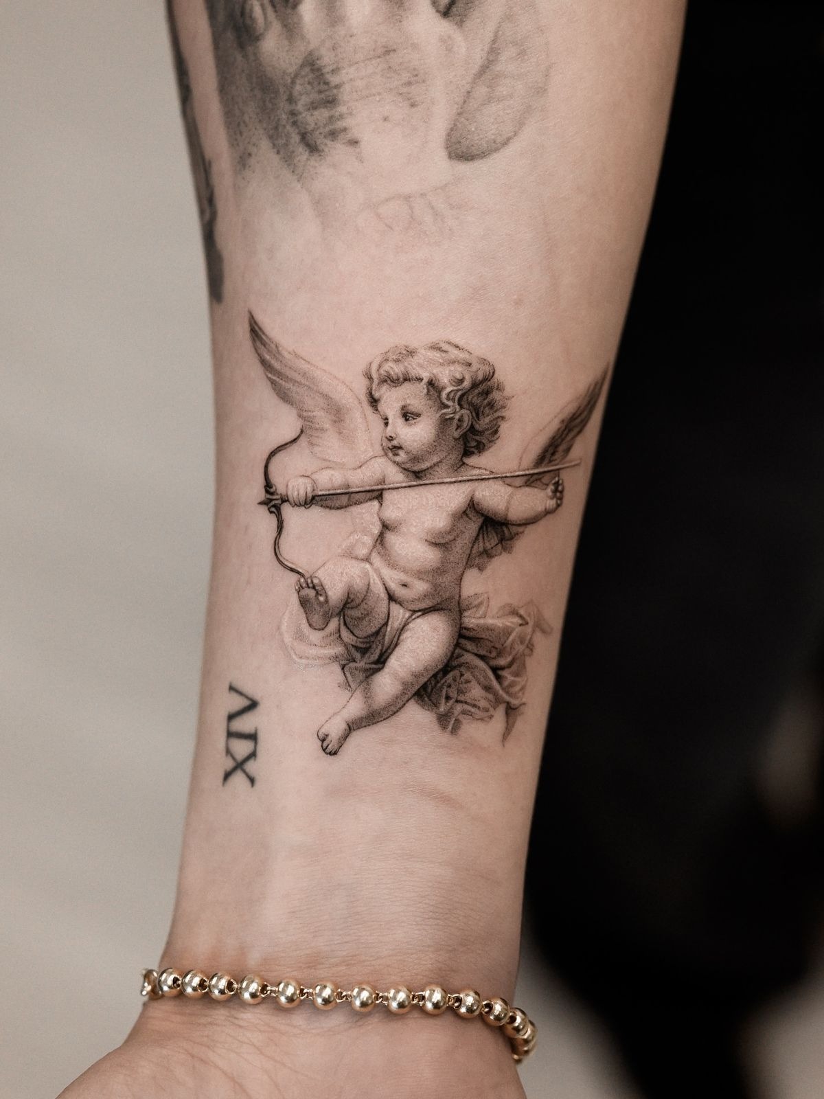 Floating Cupid with Bow Tattoo Design