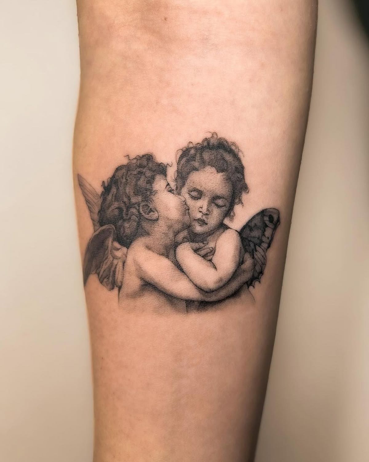 Tender Two Cherubs Kiss Tattoo Design