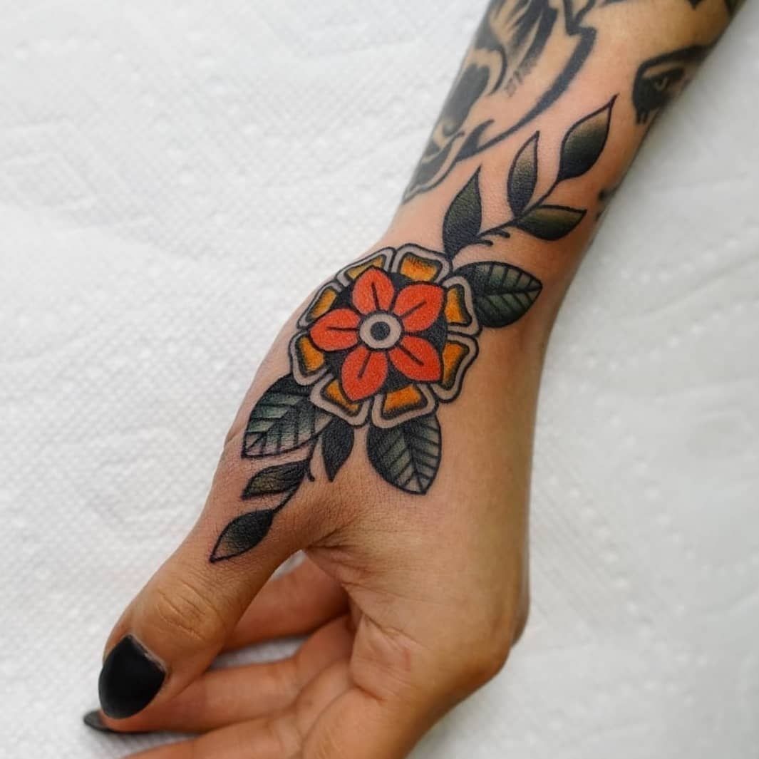 Bold Hand Blossom Tattoo Design