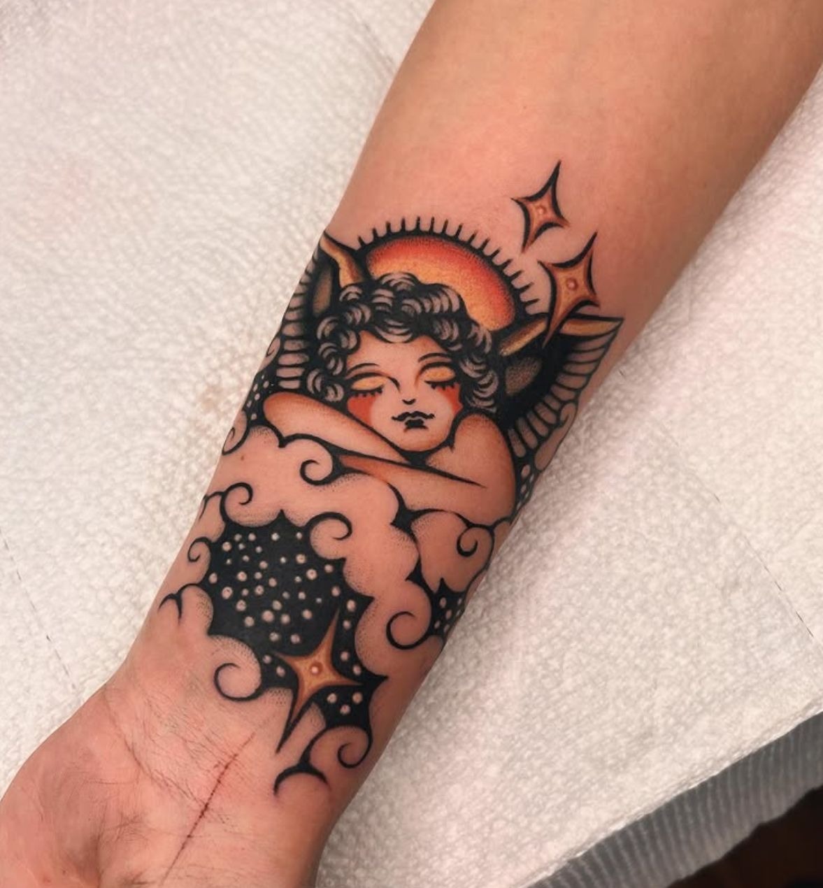 Dreaming Cherub Clouds Tattoo Design