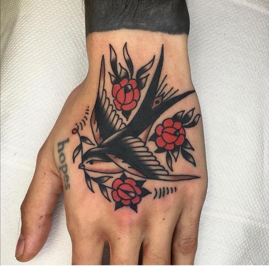 Flying Swallow With Roses Tattoo Design