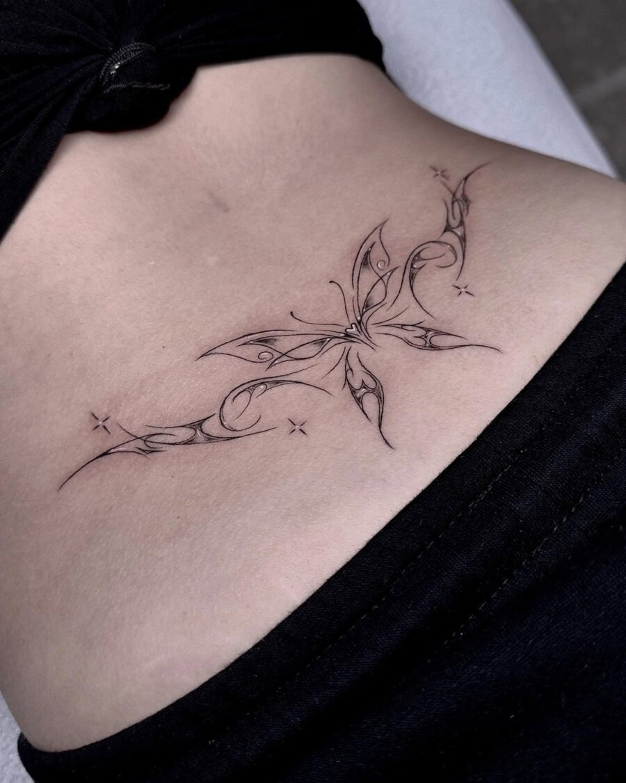 Elegant butterfly tattoo with intricate details Tattoo Design