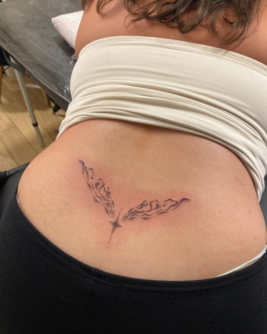 Elegant flame design tramp stamp tattoo Tattoo Design