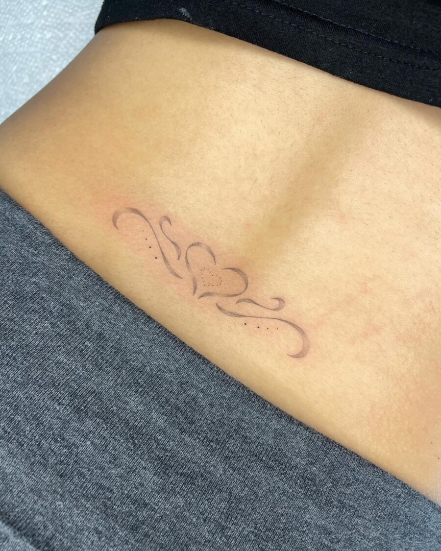 Elegant heart design with delicate flourishes Tattoo Design