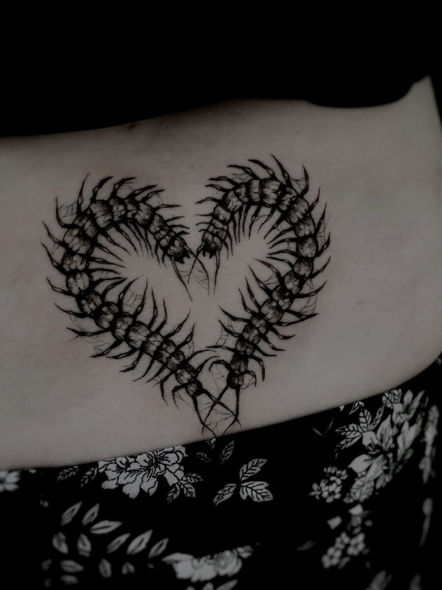 Intricate scorpion heart tattoo on lower back Tattoo Design