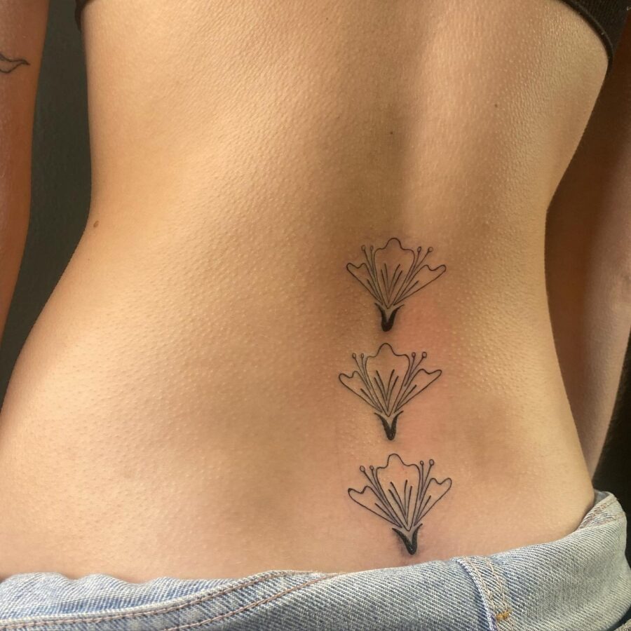 Stylish floral tramp stamp tattoo design Tattoo Design