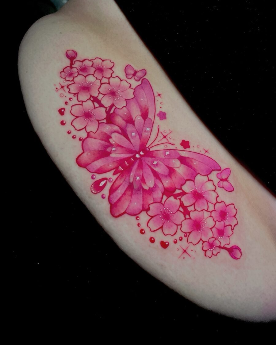 Vibrant Butterfly Tattoo with Floral Accents Tattoo Design