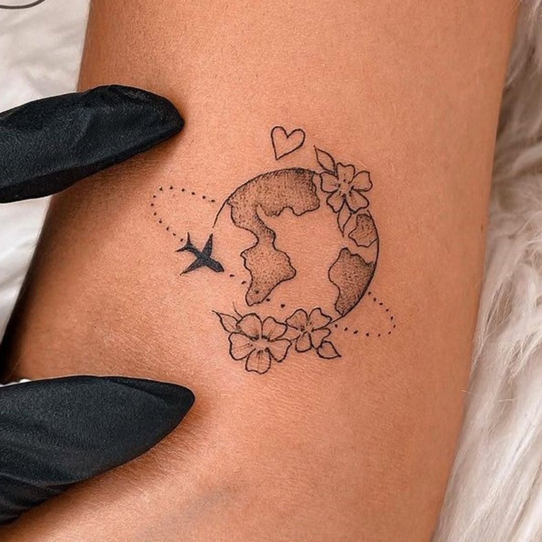 Beautiful Earth-Inspired Tattoo Celebrating Adventures Tattoo Design