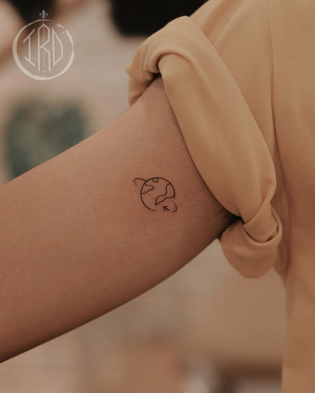 Minimalist Earth Tattoo for Wanderlust Souls Tattoo Design