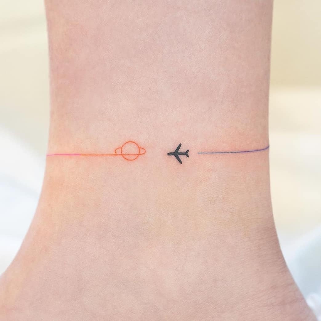 Minimalist tattoo celebrating travel and adventure Tattoo Design