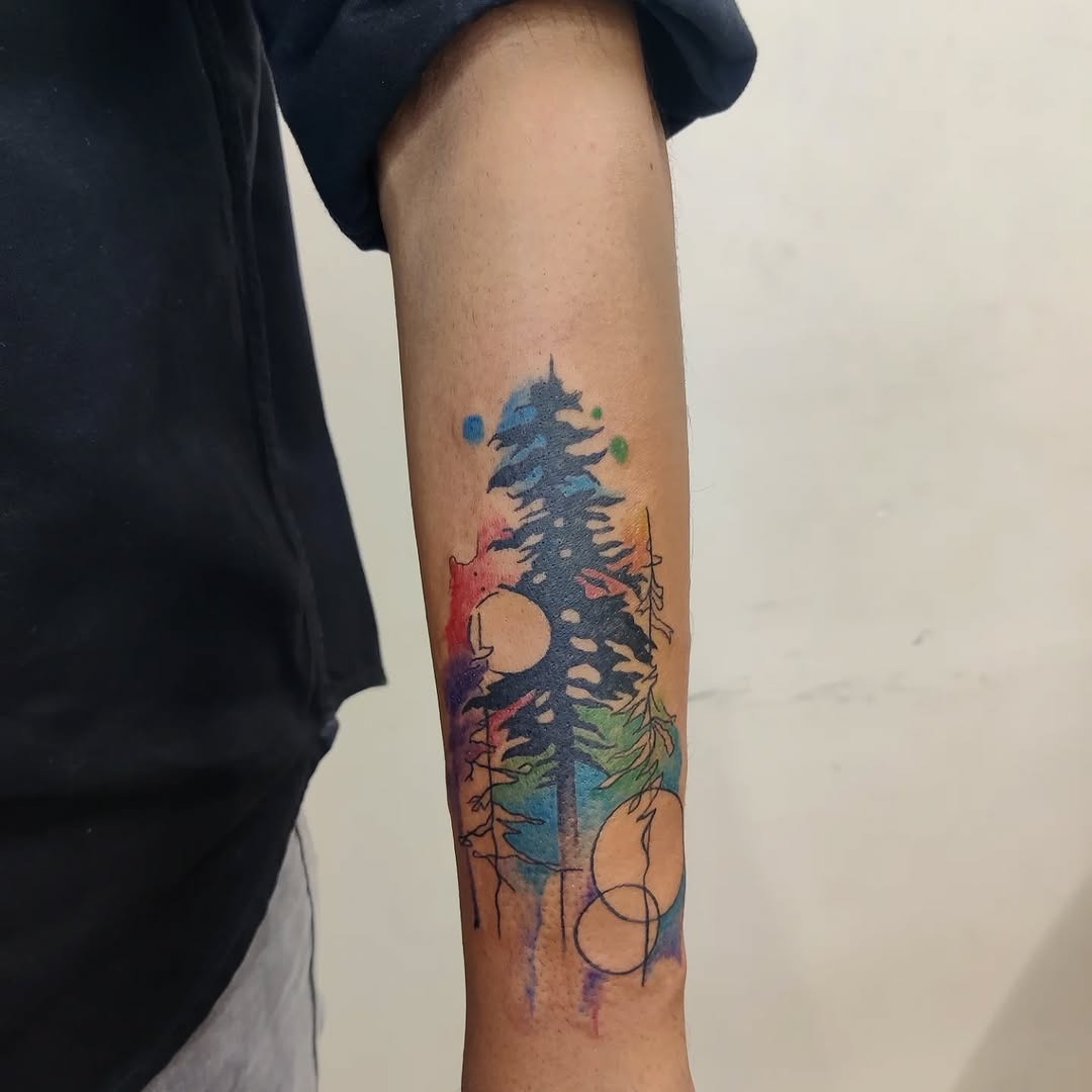 Vibrant forest silhouette tattoo with watercolor effects Tattoo Design