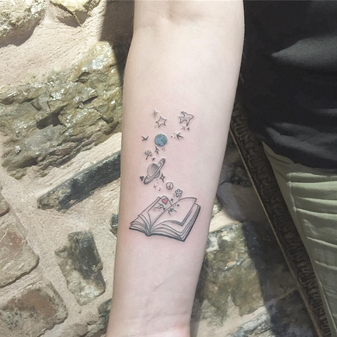 Whimsical Book Tattoo with Travel Themes Tattoo Design