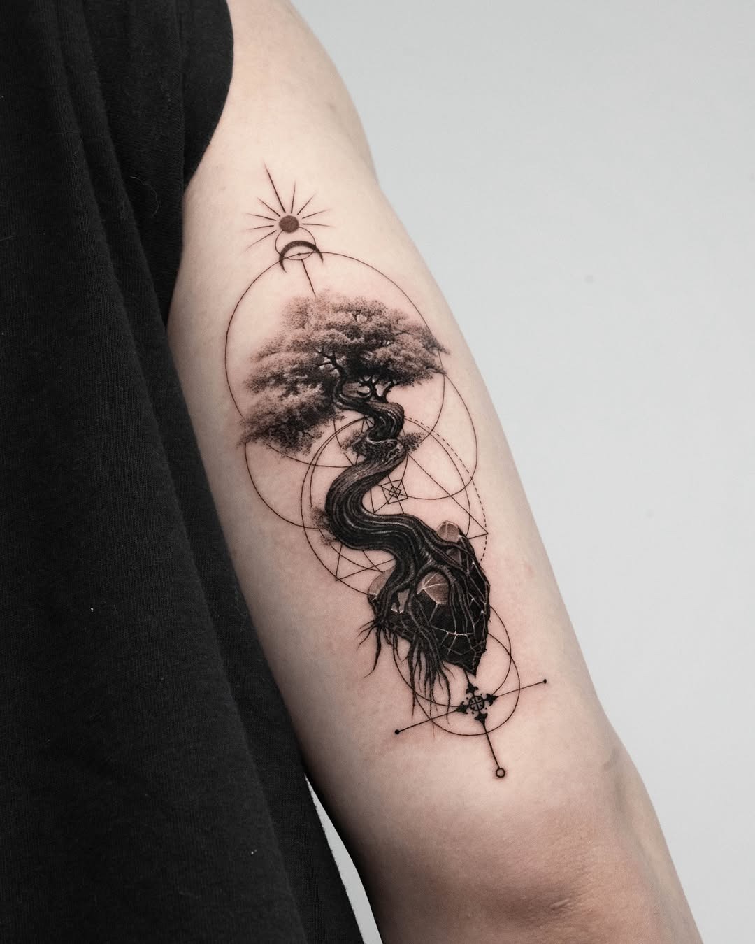 Artistic tree tattoo with cosmic elements Tattoo Design