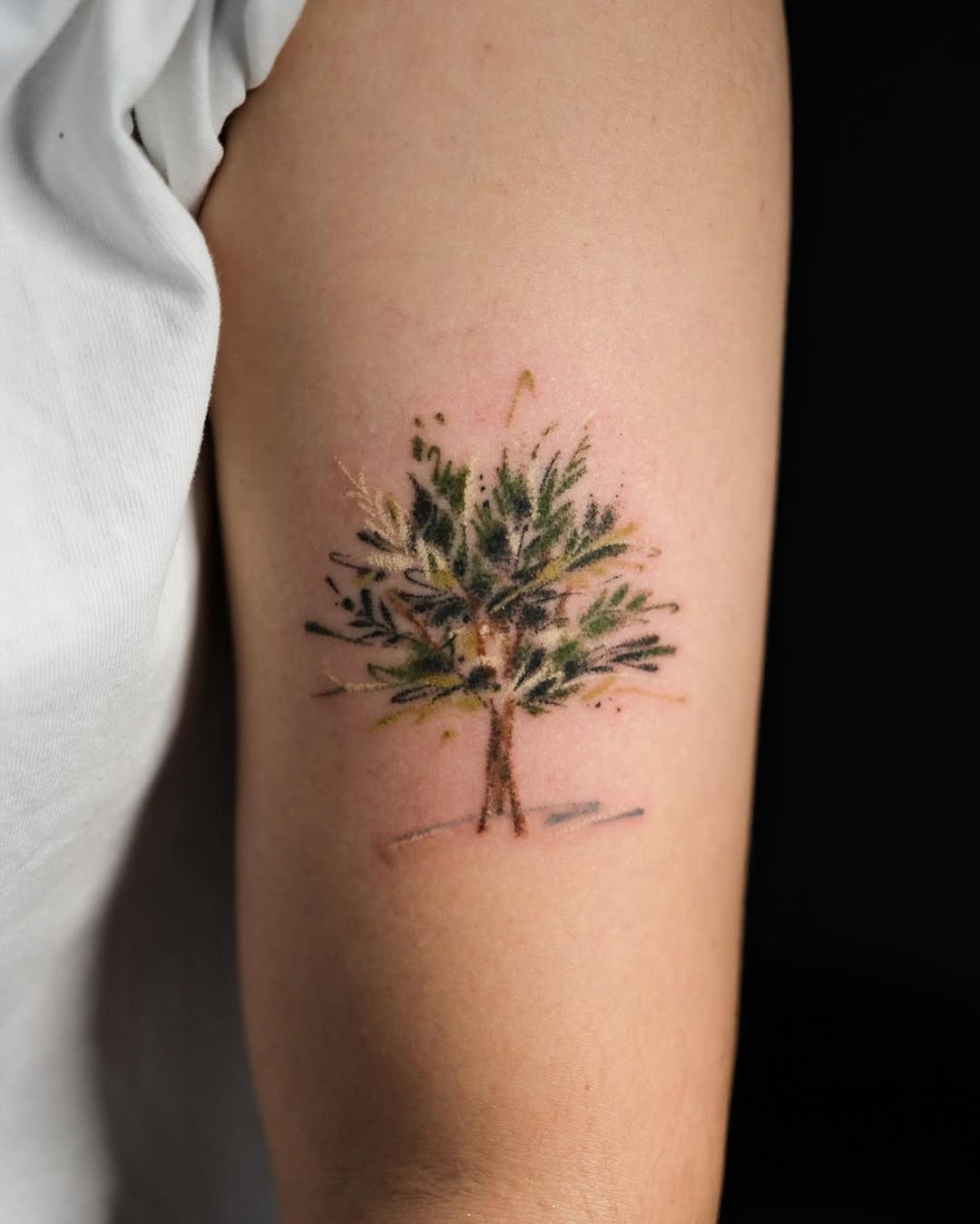 Artistic tree tattoo with vibrant colors and detail Tattoo Design