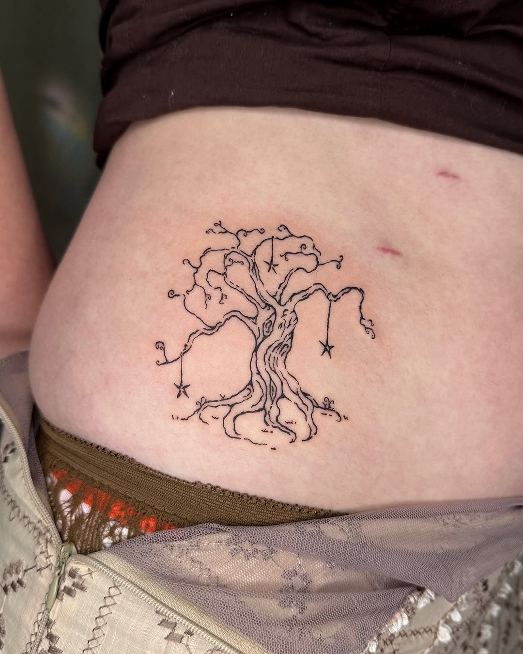 Elegant cherry blossom tattoo on the torso Tattoo Design