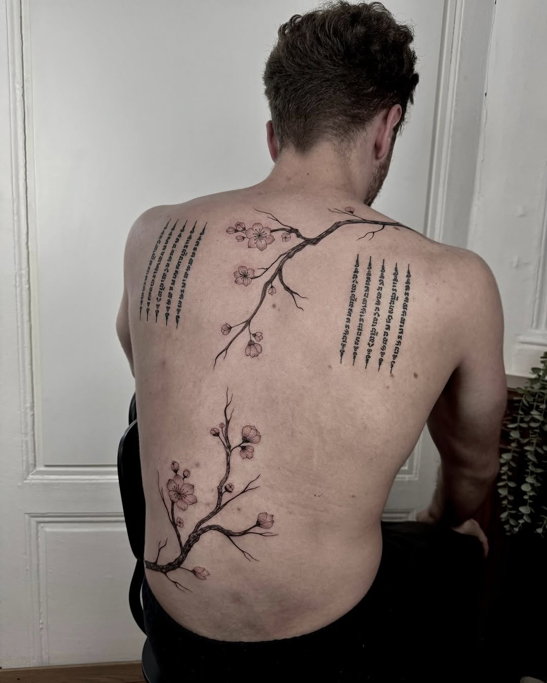 Elegant floral tree tattoo on the back Tattoo Design