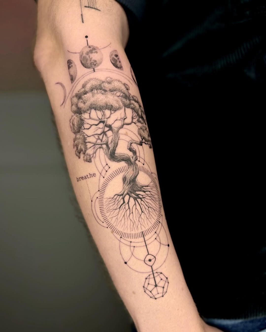 Nature-inspired tattoo with geometric elements Tattoo Design