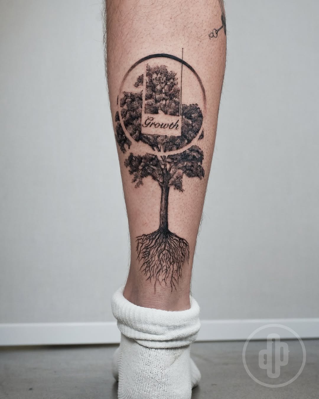 Symbolic Tree Tattoo Emphasizing Growth Tattoo Design