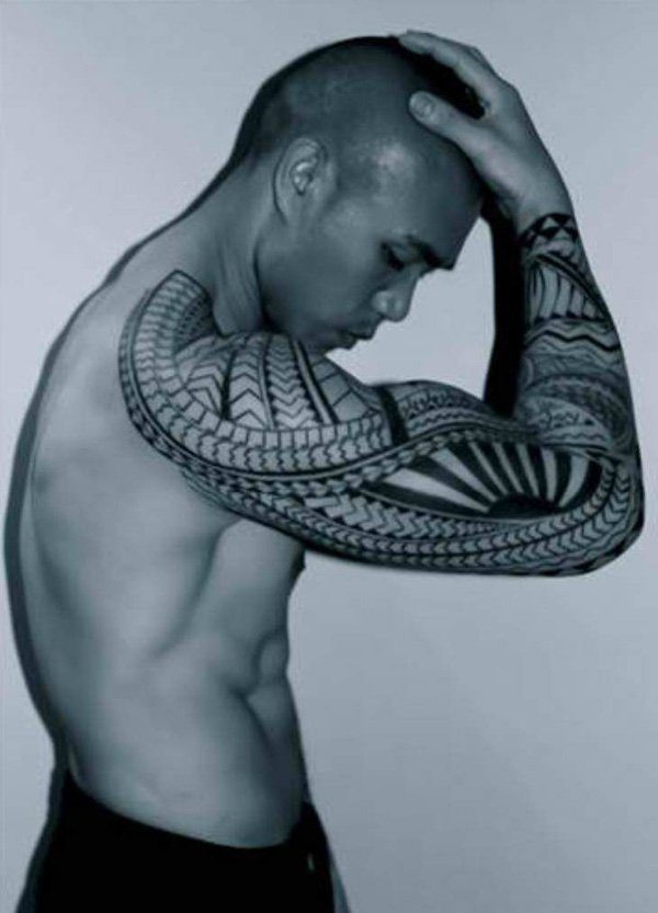 A modern Tribal Tattoo on the back of a man Tattoo Design