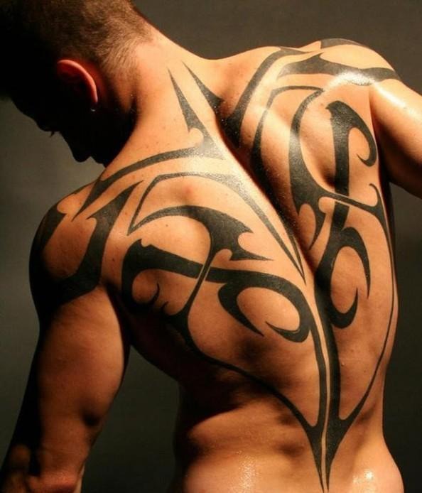 A very Cool and traditional Tribal Tattoo on a man's hand Tattoo Design