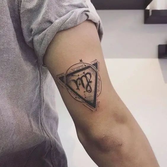 Minimal Triangle Sigil Tricep Tattoo, a tattoo design rendered in clean detailed linework for the upper arm.