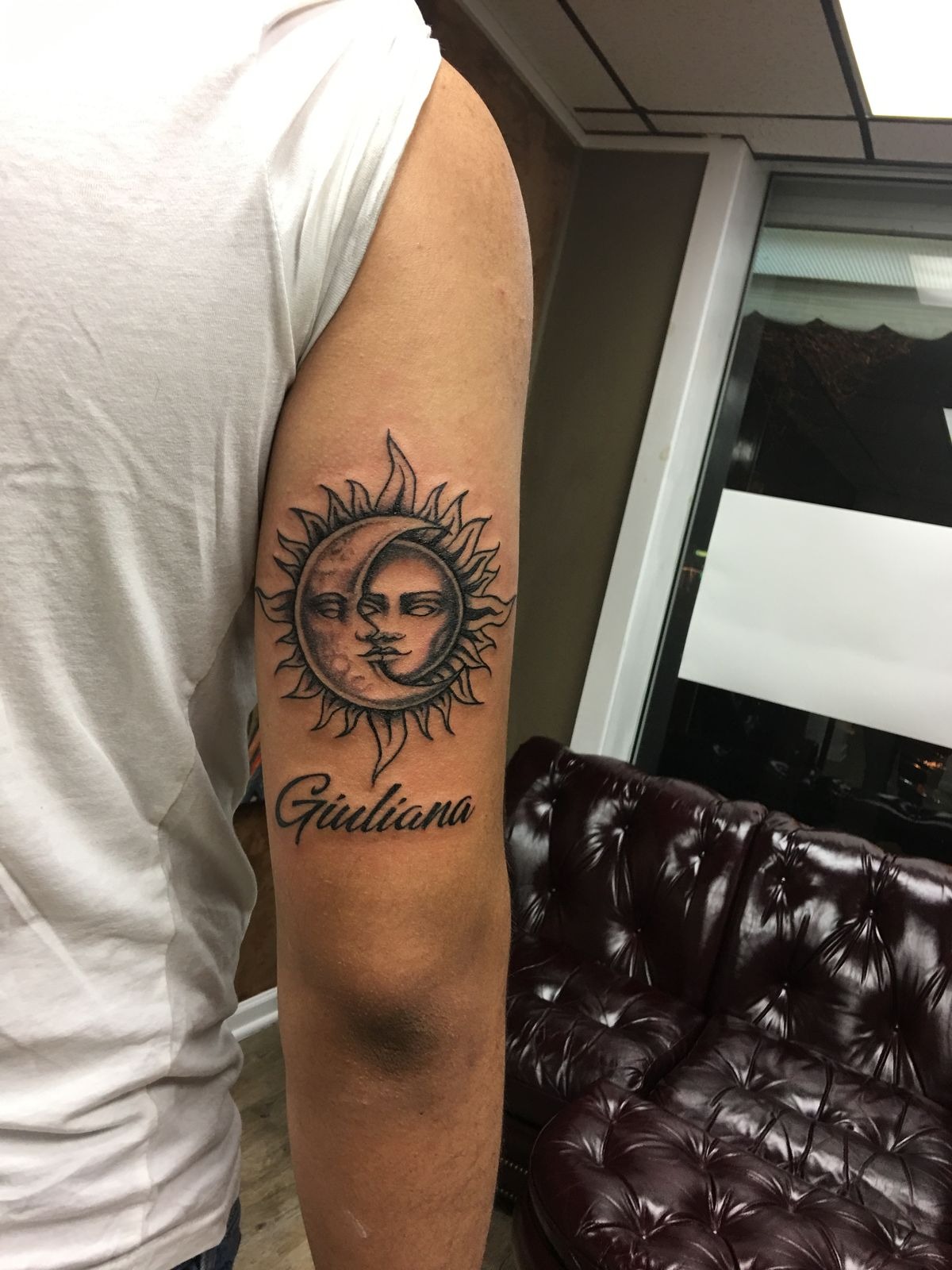 Sun and Moon Name Tricep Tattoo-less, a tattoo design rendered in clean detailed linework for the rib.
