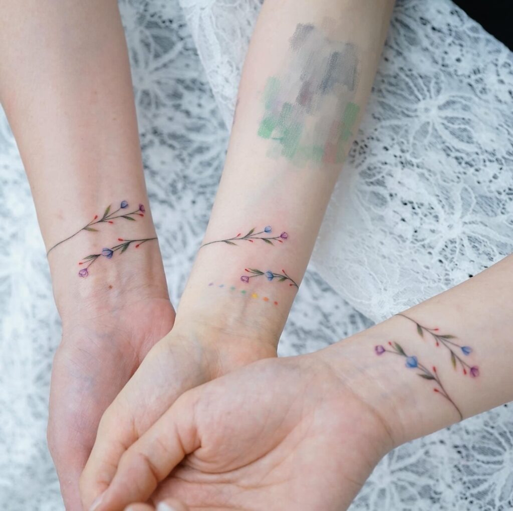 Delicate Flower Trio Wrist Tattoo Tattoo Design