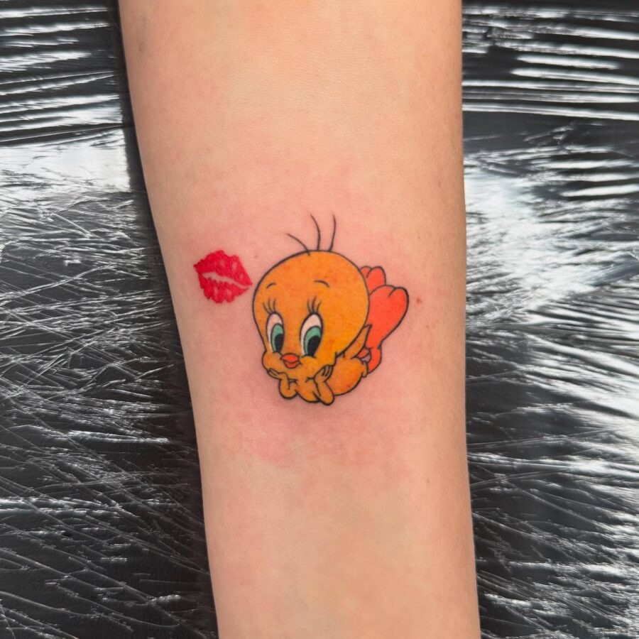 Adorable Tweety Tattoo with Lip Prints Tattoo Design