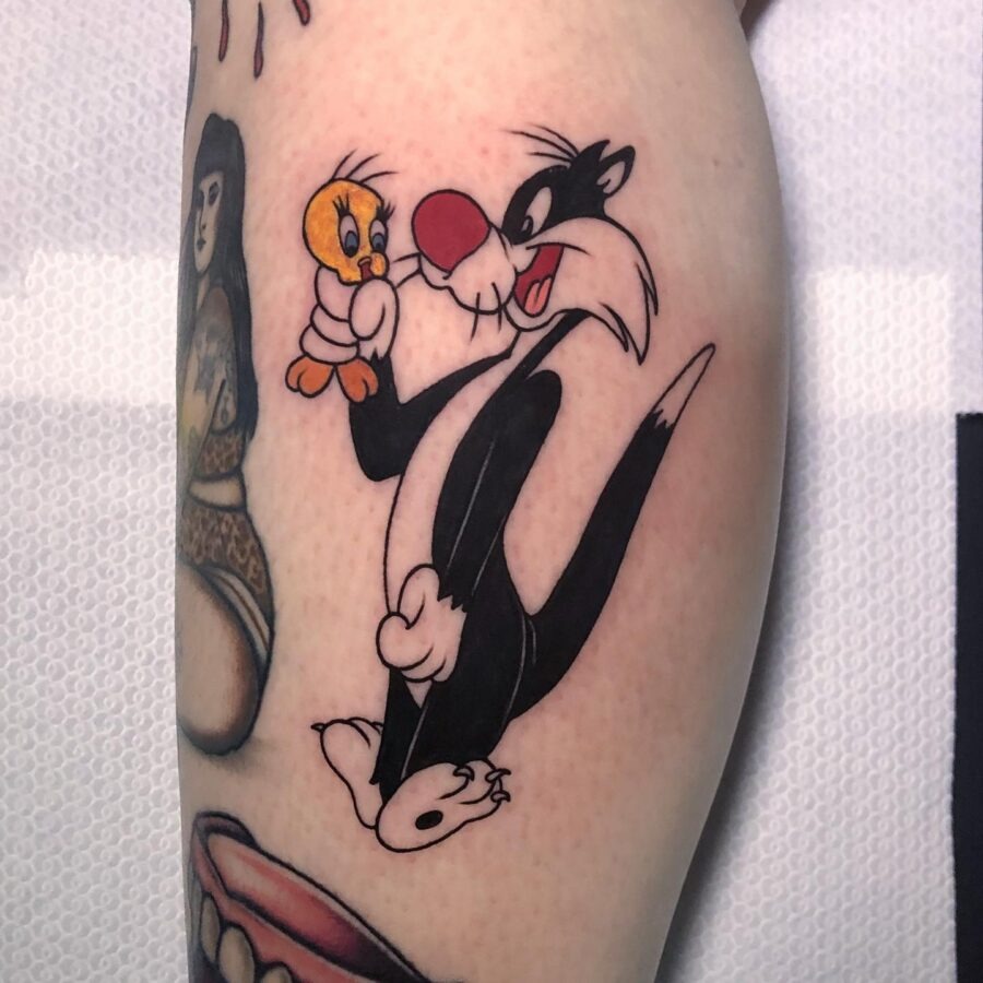 Playful Sylvester and Tweety Tattoo Design Tattoo Design