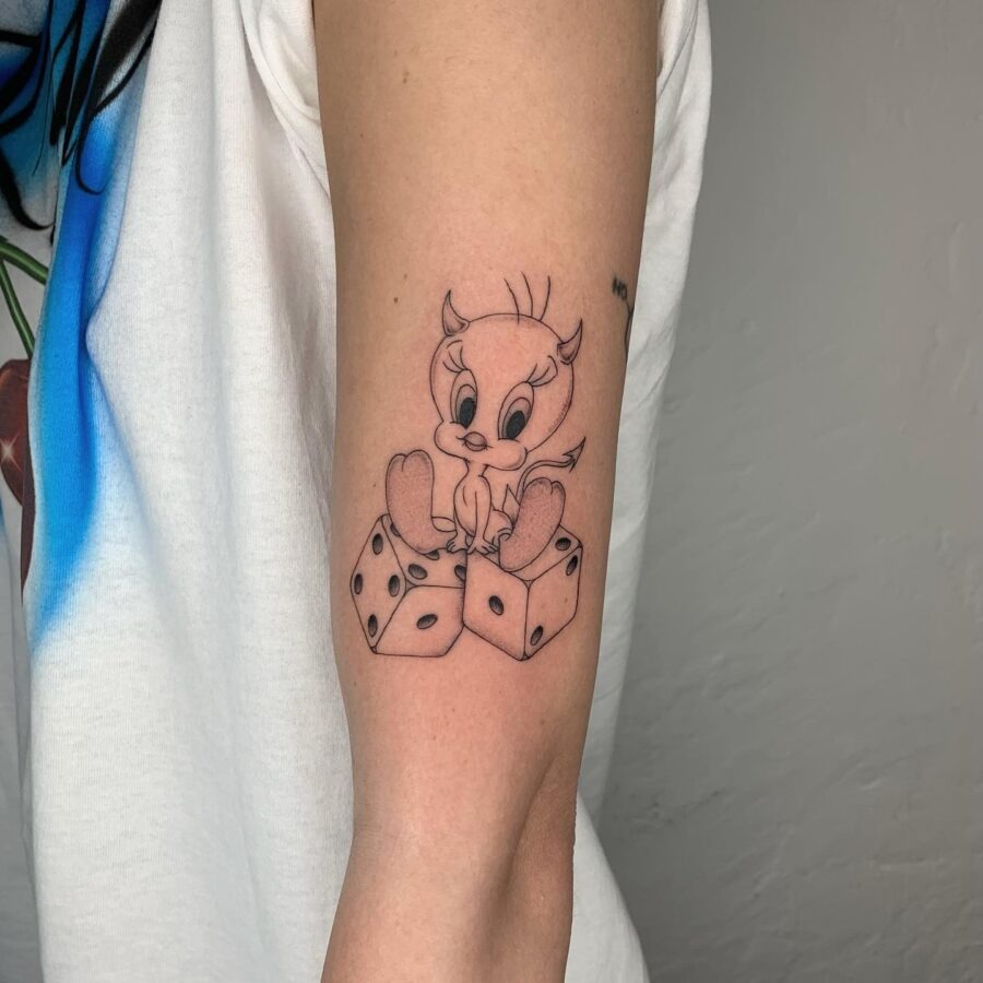 Playful Tweety Bird with Dice Tattoo Tattoo Design