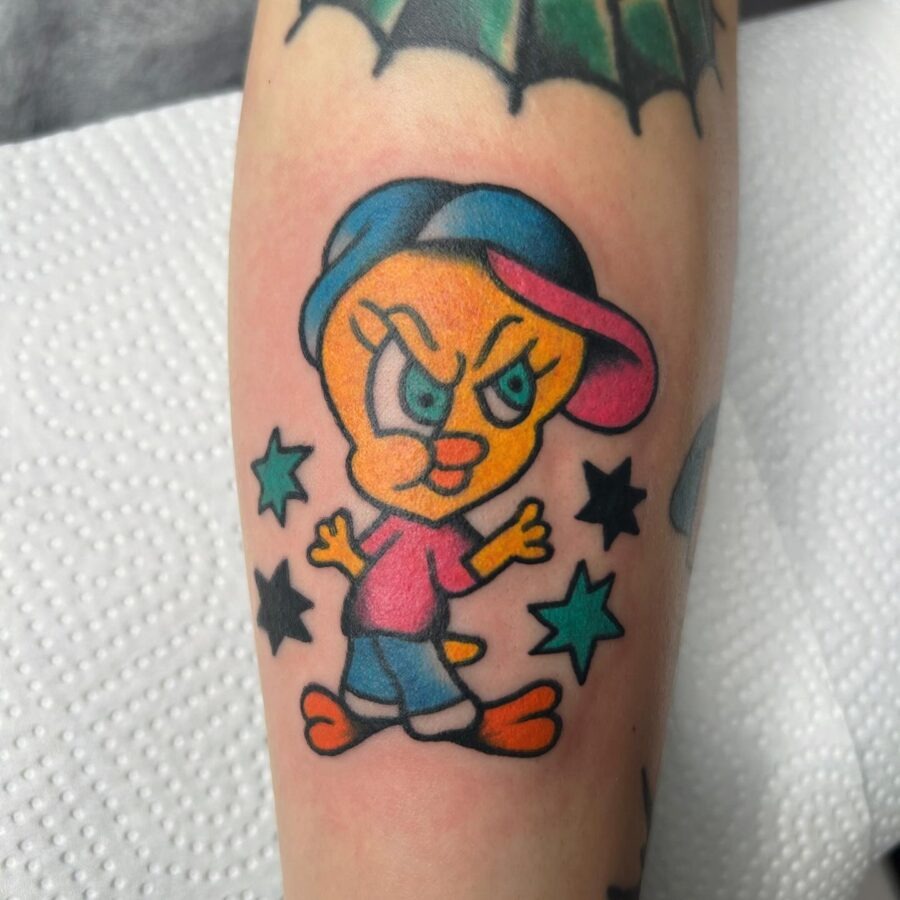 Vibrant Tweety Bird Tattoo with Attitude Tattoo Design