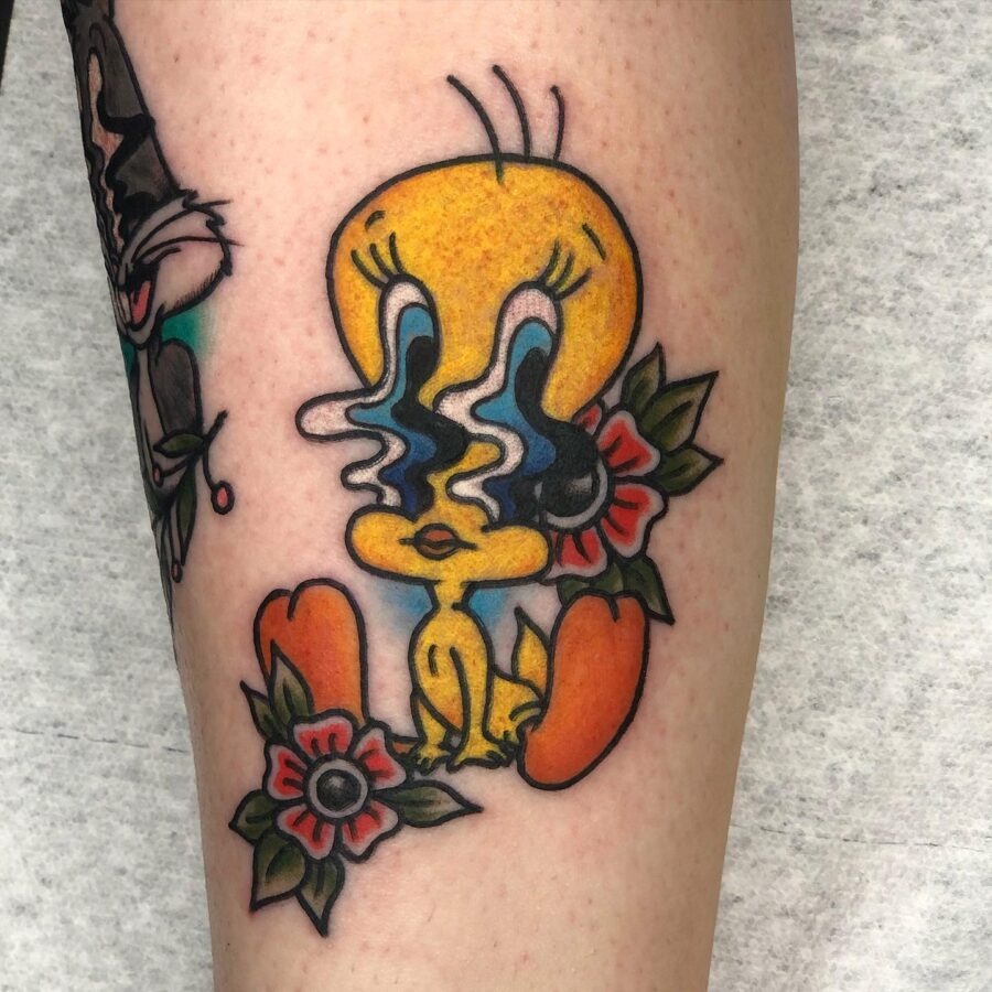 Vibrant Tweety Tattoo Surrounded by Flowers Tattoo Design