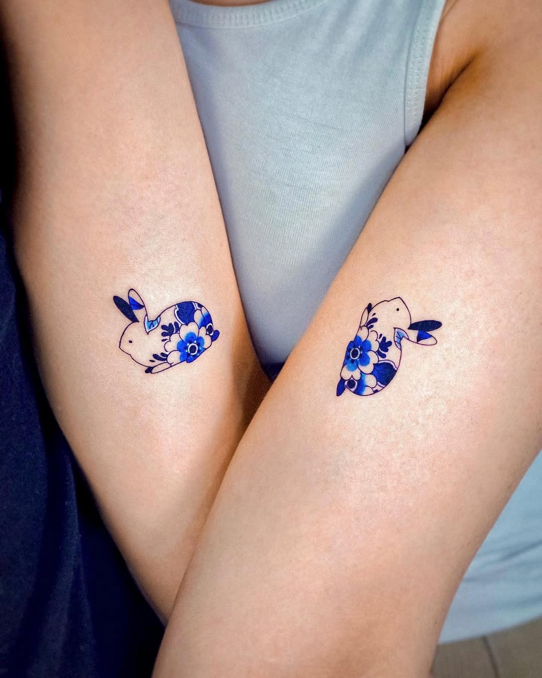 Charming floral bunny twin tattoos Tattoo Design