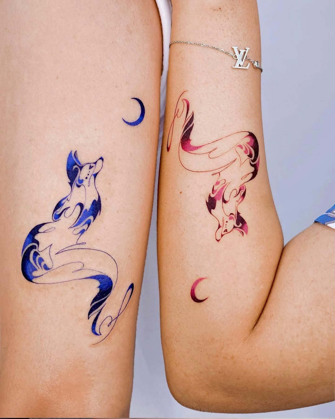 Colorful twin fox tattoos with mystical vibes Tattoo Design
