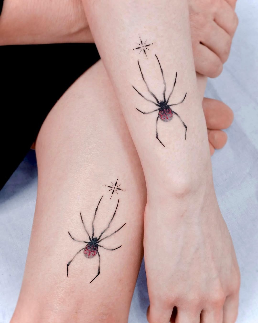 Elegant Twin Spider Tattoos with Star Accents Tattoo Design