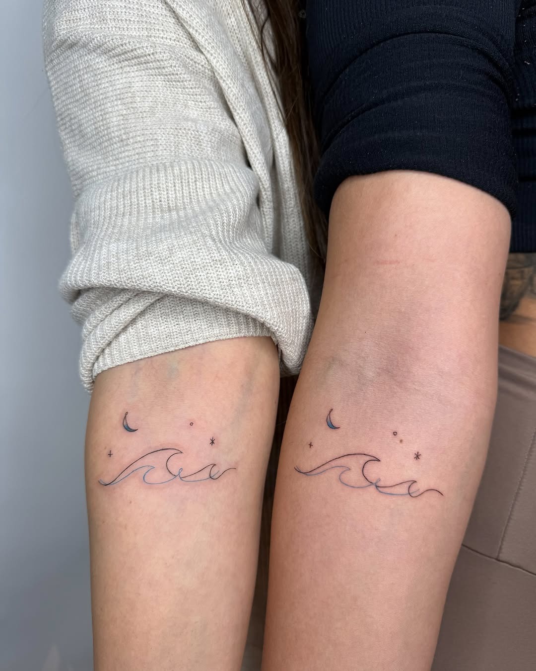 Elegant twin tattoos of waves and moons Tattoo Design