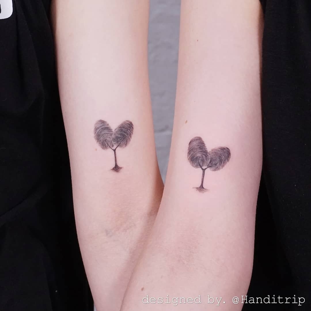 Symbolic heart-shaped tree twin tattoos Tattoo Design