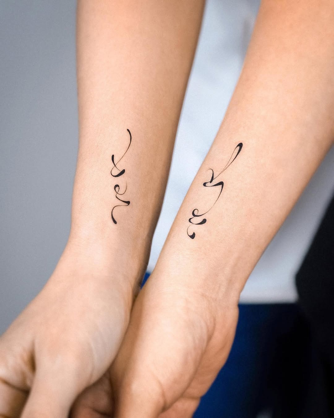 Symbolic twin tattoos showcasing unique designs Tattoo Design