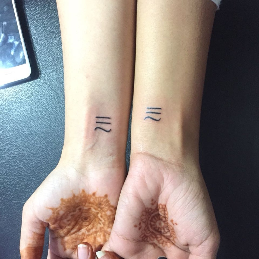Symbolic twin tattoos with a modern touch Tattoo Design