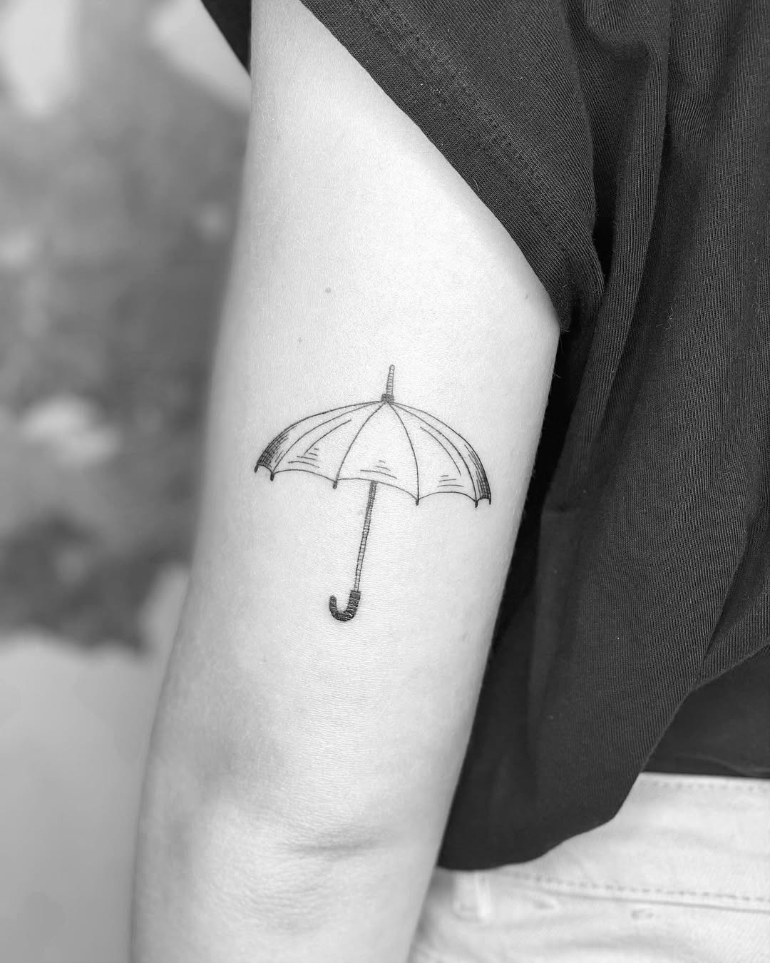 Elegant Minimalist Umbrella Tattoo on Arm Tattoo Design