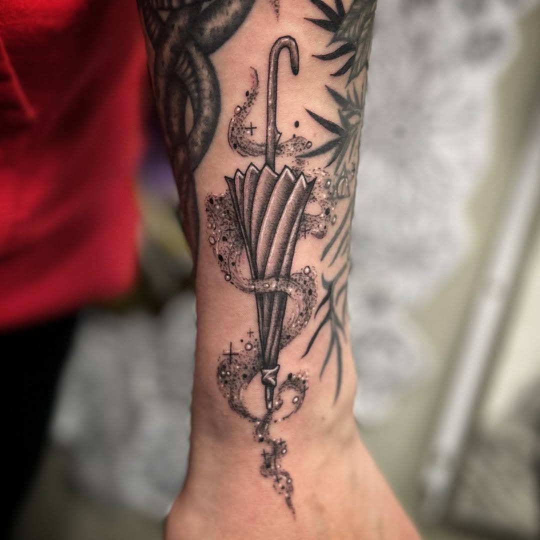 Elegant Umbrella Tattoo with Whimsical Details Tattoo Design