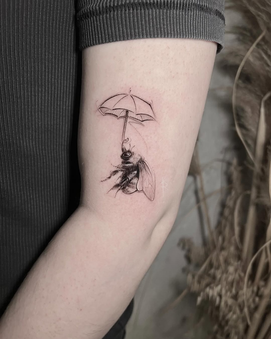 Intricate bee tattoo paired with enchanting umbrella Tattoo Design